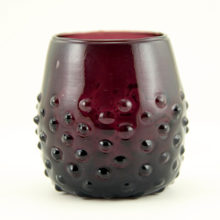 This big hobnail glass tumbler measures 4" tall with a widest girth of 12".