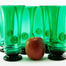 Large tall glasses, measure 7" tall, 3.25" wide mouth, weigh 3/4 lb each.