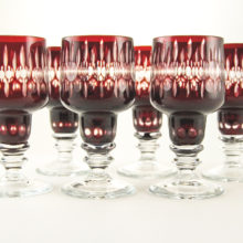 Hand-blown and hand-cut dark ruby overlay Bohemian roemers.