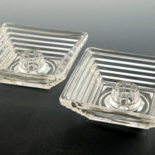 These candlestick holders were made with pressed clear glass - no seams.