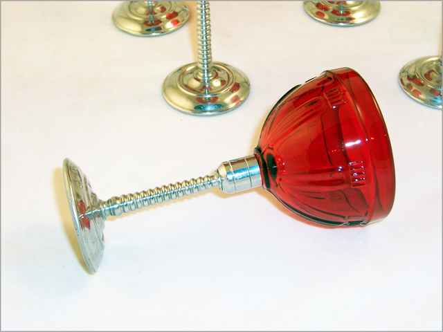Glass bowl has a threaded base.