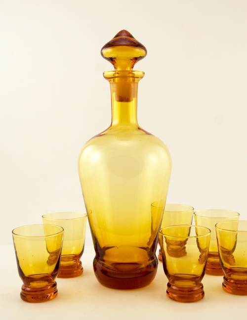 Full-size handblown decanter with six shot glasses.