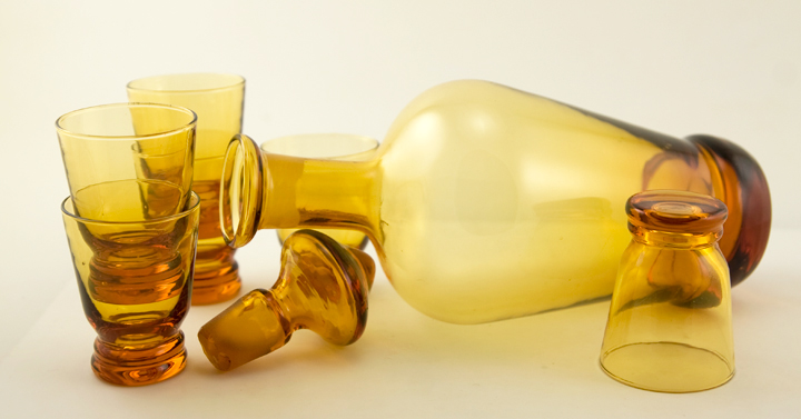 Decanter measures 10" tall, fits a normal-sized bottle of booze.