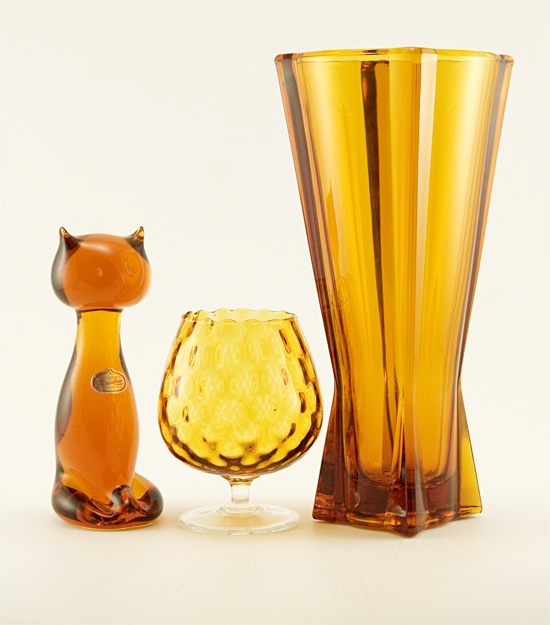 Measures 9" tall, 2 1/4" base, and 4" width at mouth.