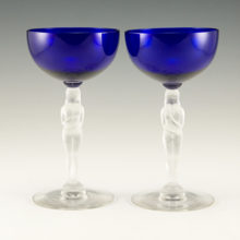 Set of two well-made nude stemmed cocktail or champagne goblets.