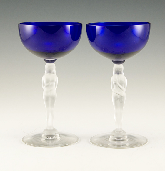 Set of two well-made nude stemmed cocktail or champagne goblets.