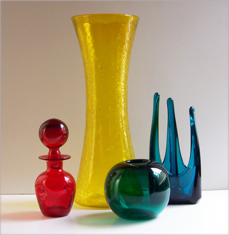 Hand-blown waisted cylindrical crackle glass floor vase.