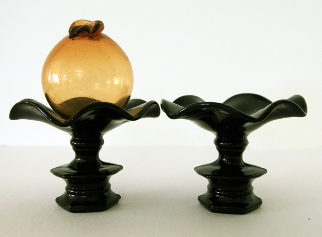 When turned upside-down, it becomes a small footed bowl.