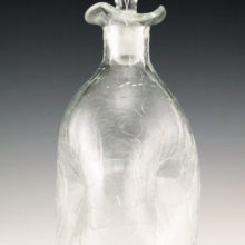 Hand blown Blenko decanter with original stopper in colorless crackle glass.