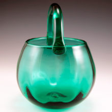 Hand-blown from panel optic mold.