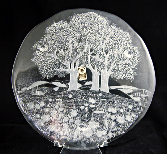 Deeply carved 3-dimensional country church scene.