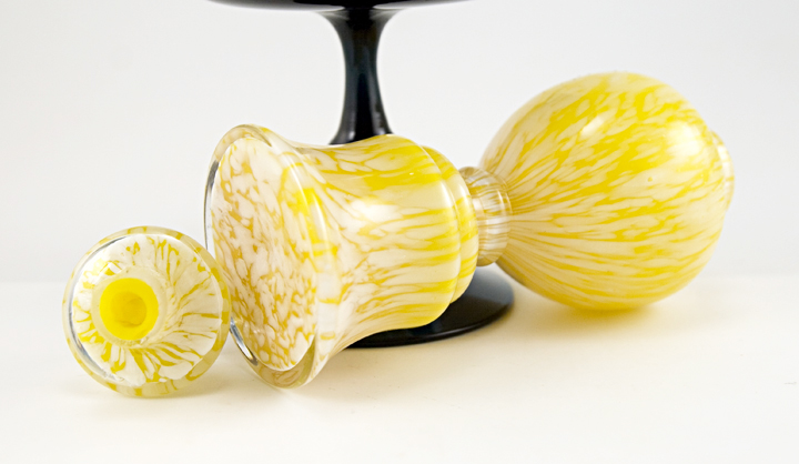 Hand blown with an inner layer of thick dark lemon yellow glass, a middle layer of mottled opaque white and a thick outer layer of colorless glass