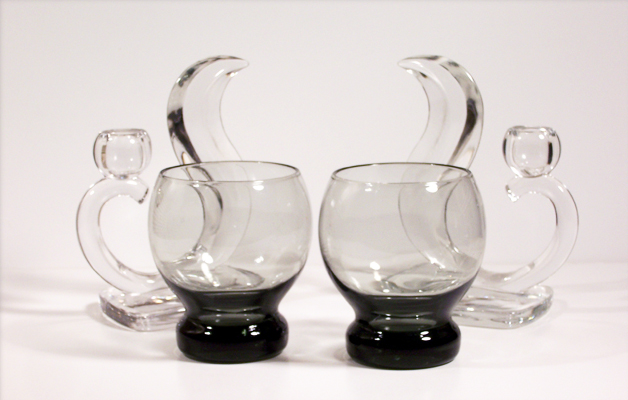 Blown smoke grey glass with weighted solid bottoms.
