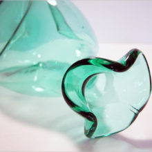 Hand blown with soft pontil marks.