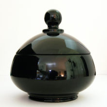 Large, elegant, stunning solid black glass Art Deco covered bowl. This well-made dish was made by Westmoreland Glass, USA, in the 1920's, original part no. 1902-4.
