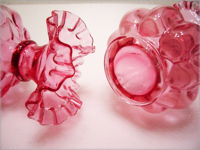 These lovely vases were blown into a mold, then hand-tooled to finish ruffles. They are melon shaped with a ruffled rim.