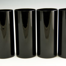Four handblown black ruby art deco hi-ball tumblers.