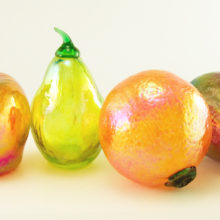 Set of four artistically beautiful, better than life-like fruit.