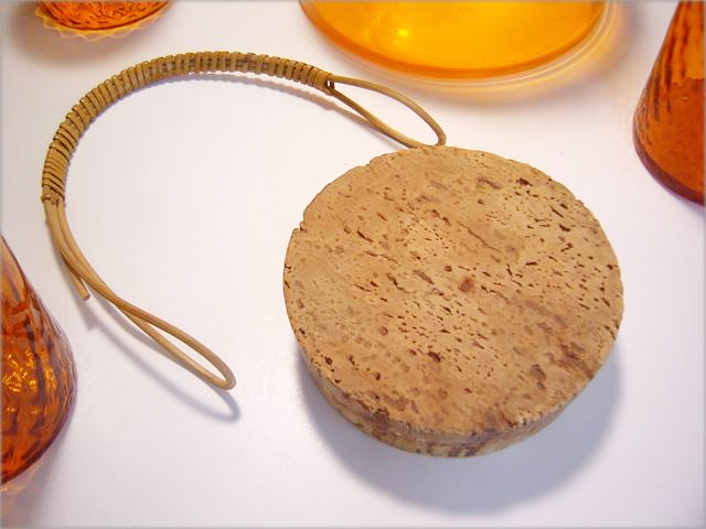 Cork top is hard with age but seals airtight and looks in amazingly good shape considering material and age.