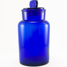 Large vintage Italian kitchen glass canister with 'Made in Italy' embossed on the seat.