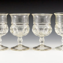 Set of four Thumprint (aka King's Crown) whiskey or cordial size goblets.