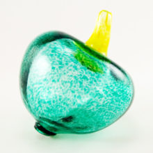 This big fat berry or gourd is signed 'Kosta Boda, (unknown center scribble), G (Gunnel) Sahlin, 98911'. It is from a limited signed edition.