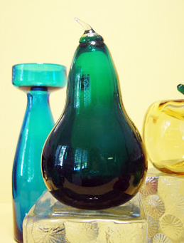 Designed in 1993. Hand blown thick glass, hollow interior, applied crystal stem.