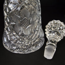 Beautiful deep patterned, bell shaped art glass decanter.