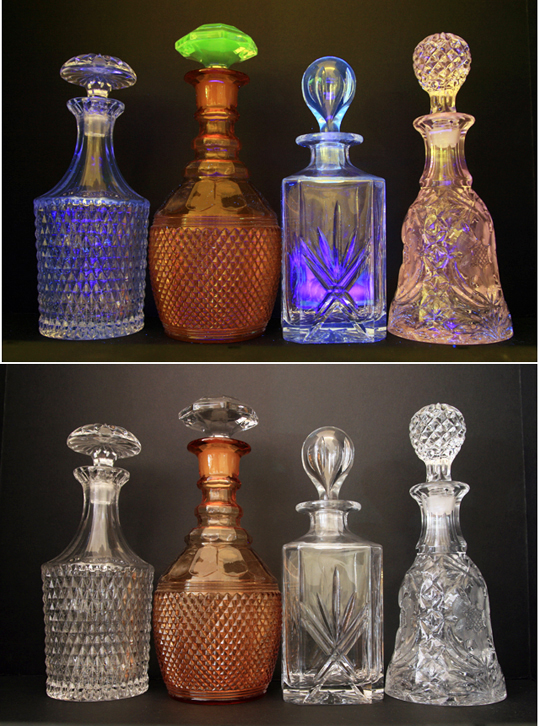 It is sitting with two lead crystal decanters and a Cambridge decanter with a manganese stopper (glowing green).