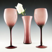 Hand blown cased glass with white inner casing and amethyst / purple outer casing resulting in a creamy grape color.