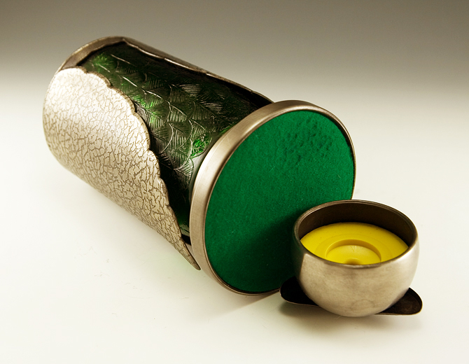 Has a felt covered bottom.
