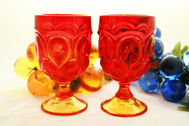 The beautiful amberina glass of the Moon and Star goblets gradually blends in ruby red and yellow.