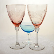 Pair of rare elegant glass Tiburon 9oz goblets with etched roses.