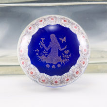 Unusual Murano feminine paperweight with gold leaf woman in flower and butterfly garden encircled with millefiori blooms.