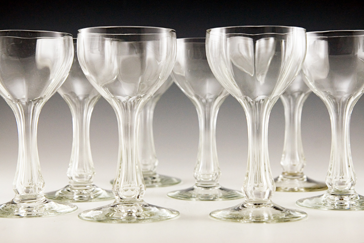 Elegant blown and cut optic paneled hollow stem goblets by Old Morgantown Glass.