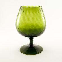 Rich olive green thumbprint optic table size snifter vase.