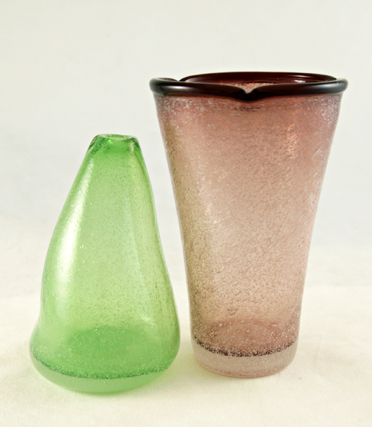 Free blown vintage glass with dense interior bubble decor.