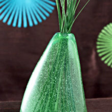 In retro lime-green, a popular color of the mid 20th Century.