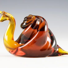 Beautiful vintage glowing amber glass snail figurine.