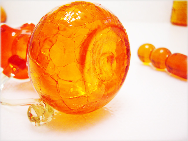 Hand blown, crackled, applied clear handle, soft pontil mark.