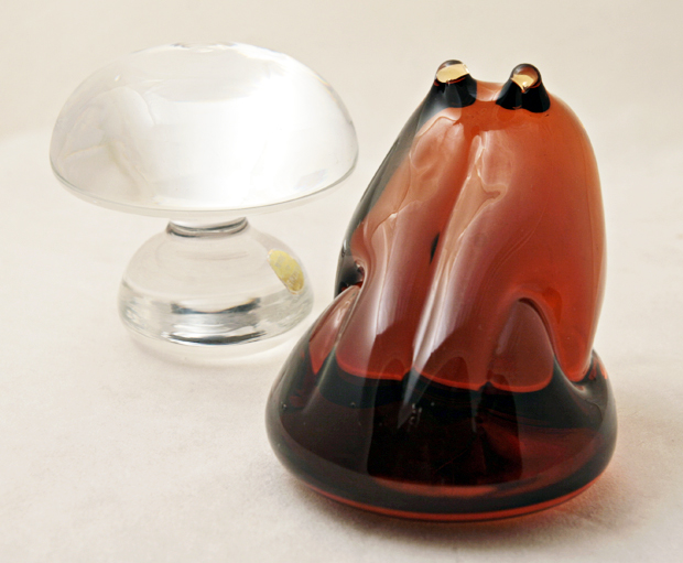 Also rare to find in this beautiful solid amber color which reflects light so well. Dark areas in the images are reflections. The color is an even deep amber.