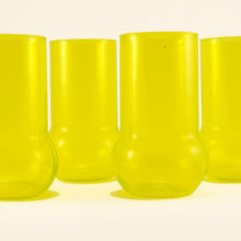 Hand-made retro vintage glass bubble bottom tumblers from the mid-20th Century.