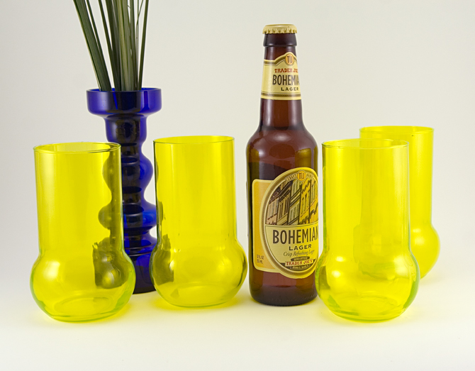 Aseda, a popular Scandinavian glass blower in the 1960's had a line of yellow neon-like glass with a distinct 'glow' like this.