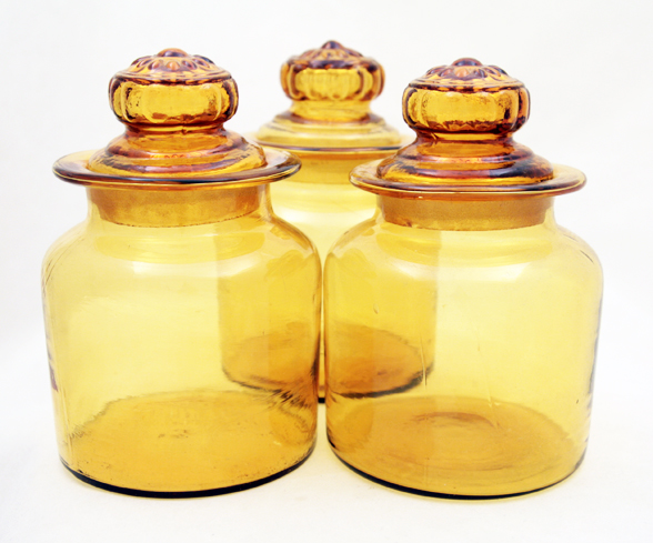 Set of 3 glass apothecary canister jars.