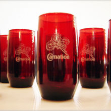 Set of 8 Royal Ruby glass Newport Carnation premium tumblers.