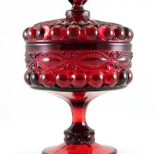Stunningly beautiful Eyewinker pattern jar in vintage ruby red glass.