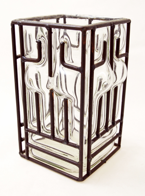 Vintage reticulated glass vase with a sexy motif.