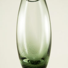 High quality smoke glass bullet vase internally decorated with stylized bubbles.