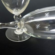 Blown glass with hand-etched 6 pointed stars in bevel.