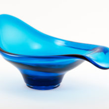 Beautiful hand-made rolled lip bluenique glass bowl.